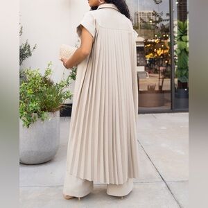 06. First Class Pleated Trench Coat and High Rise Pants in Oat Milk